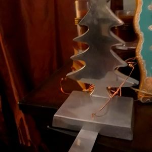 Silver  stocking hanger. With blemish